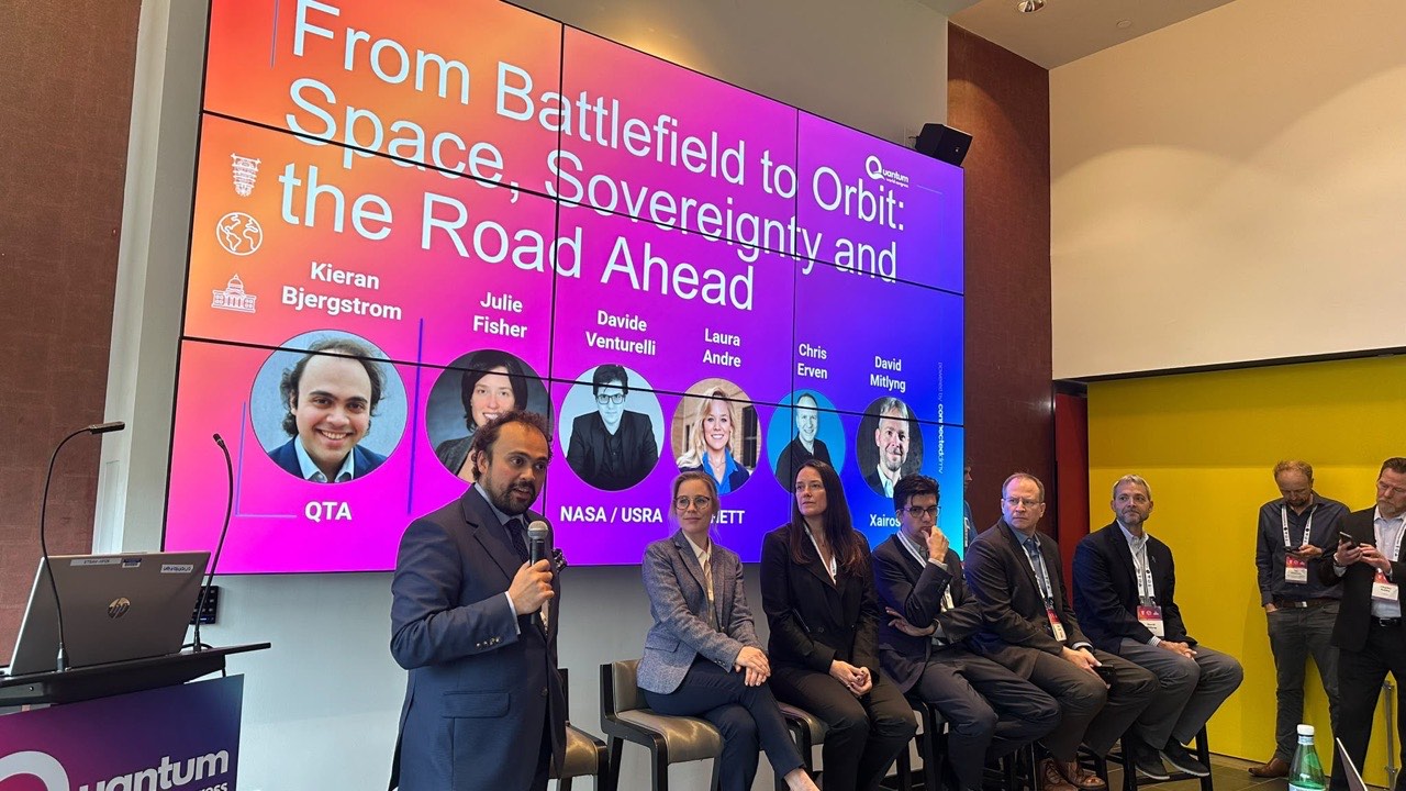 Davide Venturelli speaking during a Quantum World Congress panel titled From Battlefield to Orbit: Space, Sovereignty and the Road Ahead